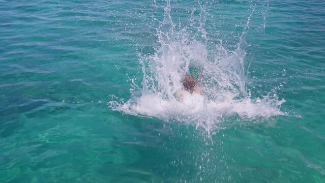Girl Films Herself While Jumping Into The Ocean