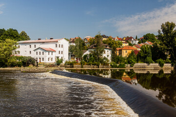 Fototapeta na wymiar Vesely weir at Luznice river with a former mill in Tabor city, Czech Republic