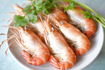 shrimp on white plate dining table food, Fresh shrimps prawns seafood with herbs and spice boiled shrimp