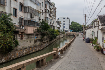 Naklejka na ściany i meble View of a water canal in Suzhou, Jiangsu province, China