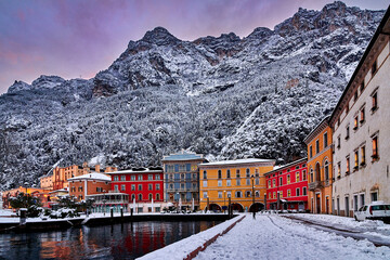Riva del Garda town and Garda lake in the winter time on a snowy day,Trentino Alto Adige region