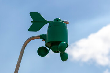 Weatherstation with anemometer, a meteorological instrument used to measure the wind speed and...