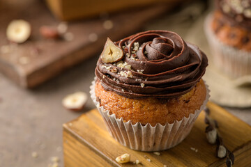Chocolate chip muffins decorated with chocolate ganache