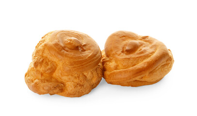 Two delicious fresh profiteroles on white background