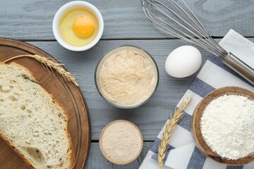 Flat lay composition with sourdough on grey wooden table