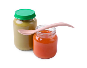 Glass jars with healthy baby food and spoon isolated on white