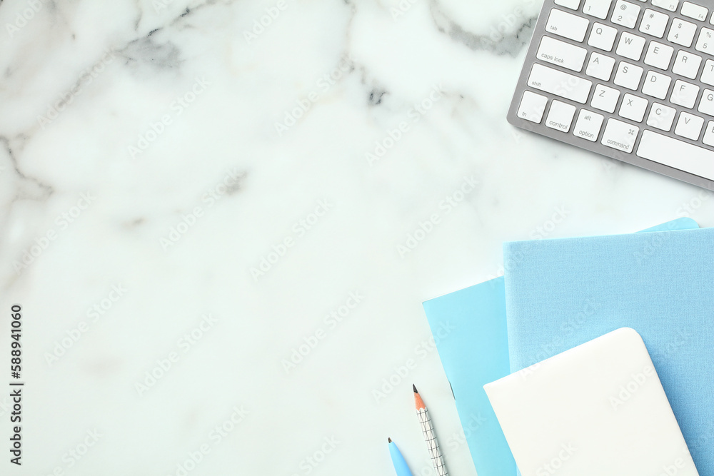 Aufkleber minimal elegant workspace with paper notebooks and keyboard on marble desk table. top view. flat lay