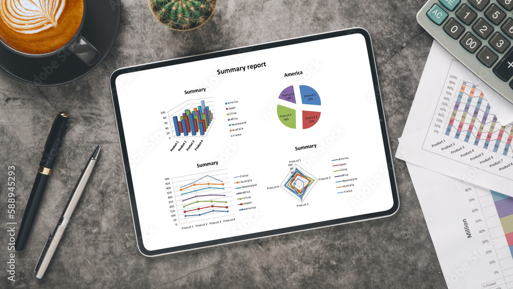 Poster tablet with charts and reports on office desk workplace. top view flat lay..