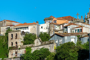 Fototapeta na wymiar Oporto, Portugal. April 12 , 2022: Landscape in the city with blue sky and city architecture.
