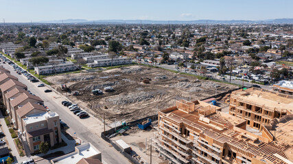 Afternoon aerial view of demolition and new construction in downtown Watts, California, USA. - obrazy, fototapety, plakaty