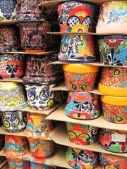 Fototapeta na wymiar traditional mexican handmade tile pots, talavera