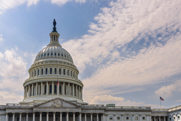 Close up of US Capitol Building dome with cloud sky