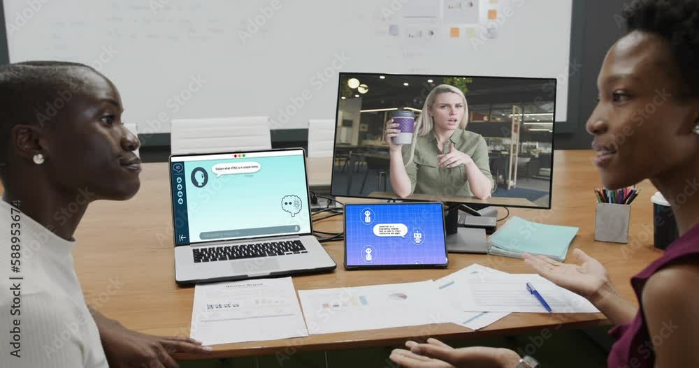 Poster diverse businesswomen in office using computers with video call and ai messaging on screens