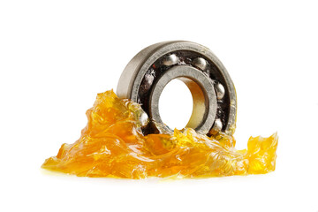 Grease and ball bearing  isolated on white background with clipping path, lithium machinery...