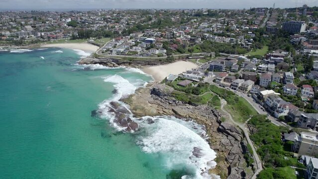 Bronte Beach With Sydney Skyline During Daytime In Australia - aerial shot