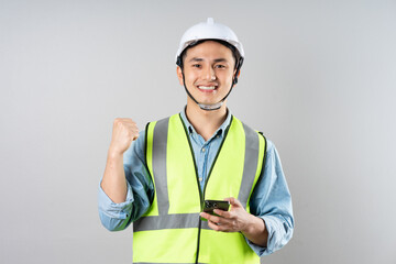 Asian engineer portrait on gray background