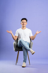 image of asian boy posing on purple background