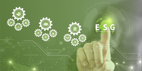 Businessman touching ESG icon on virtual screen for environmental, social, and governance in...