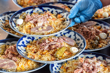 Fresh cooked wedding Uzbek plov in Tashkent, Uzbekistan