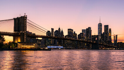 Fototapeta na wymiar New York City Brooklyn Bridge and Lower Manhattan at Sunset