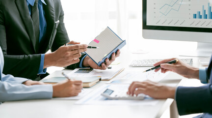 Businessperson advisor, business people talking, planning analyze investment and marketing on tablet in office..