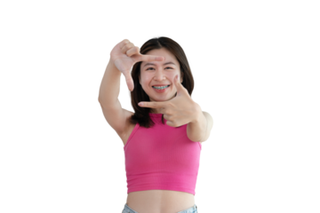 Playful young asian woman in good mood posing for photo or photo frame with fingers on PNG file,  Use your fingers to act like a photograph, Mark as if taking a photo.