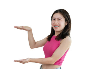 Obraz na płótnie Canvas Asian woman with holding copyspace imaginary on the palm to insert an ad, Showing copyspace pointing, Showing her hand to present something on png file.