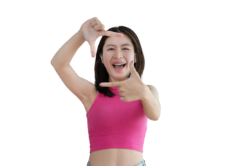Playful young asian woman in good mood posing for photo or photo frame with fingers on PNG file,  Use your fingers to act like a photograph, Mark as if taking a photo.
