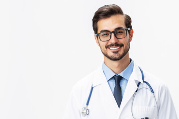 Fototapeta premium Man smiling with teeth doctor in white coat and eyeglasses and stethoscope looking into camera on white isolated background, space for copy, space for text, health