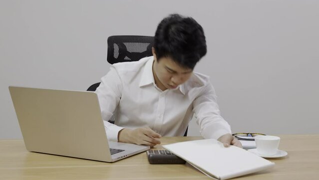 Man with narcolepsy is fall asleep on office desk..Narcolepsy is a sleep disorder that makes people very drowsy during the day.