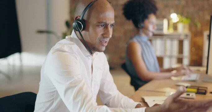Angry business man, call center and computer problem in office, online 404 glitch and stress at night. Mad, anger and frustrated agent on desktop with sales crisis, challenge and unhappy for mistake