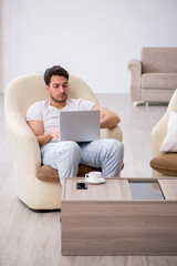 Young man starting day at home