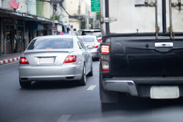 Fototapeta na wymiar Rush hour cars on city streets. Cars on the highway in traffic jams