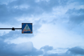Pedestrian crossing light sign pedestrian crossing the road A sign indicating a safe crossing of...