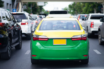 Taxis and cars in rush hour city streets. Cars on highways in traffic jams