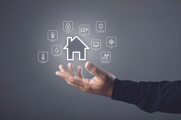Smart Home and new technology to management the house, House intelligent control system concept, Hand shows the signs of smart home icon on dark background, Idea of new smart solution.