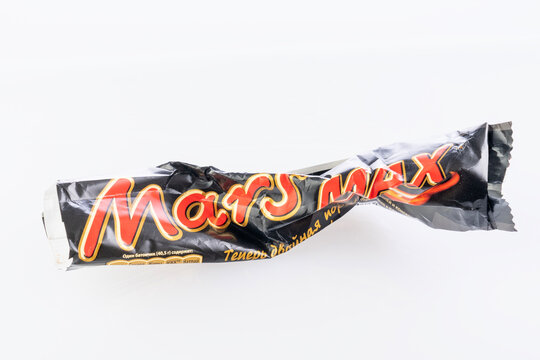 chocolate bar wrapper mars crumpled on white background