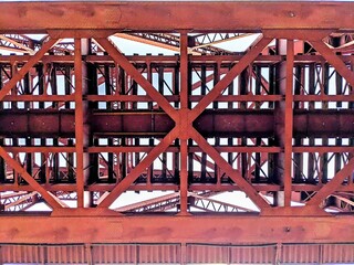 100 years old steel structure rail bridge over the river