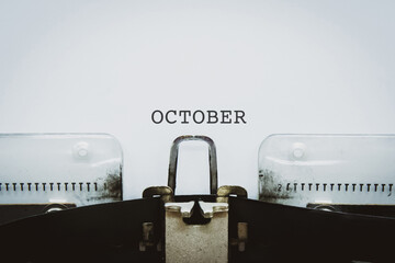 Text month October written on a vintage typewriter.