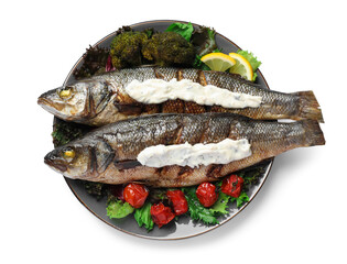Plate with delicious sea bass fish and ingredients isolated on white, top view