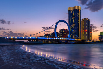 Beautiful Lusail Arch Bridge view at sunset time 