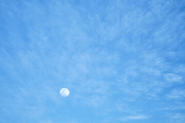 Evening blue sky with full moon clouds, idea for background, sunset on the Aegean coast, ramadan