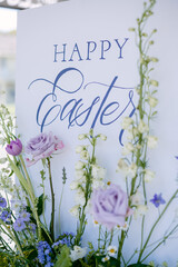 Happy Easter sign with flowers