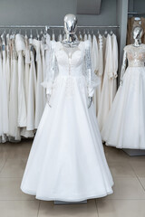 Beautiful wedding bridal dresses on mannequin in showroom