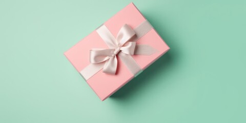 Pink gift boxe with bow on pastel background