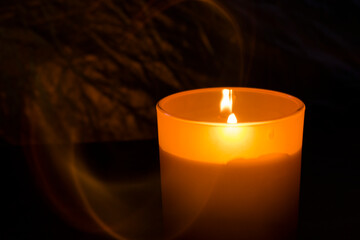 Candle lights on the dark background, romantic