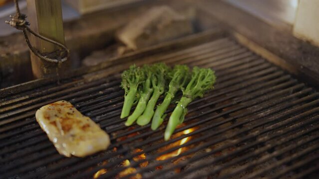 Pork and Broccolini on Charcoal Fire Grill