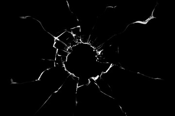 Concept of broken glass with hole for design on black background.