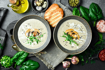 Vegan Mushroom cream soup with mushrooms and cream. In a bowl. The concept of vegetarian food.