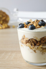 Tasty and nutritious breakfast concept - muesli with yogurt